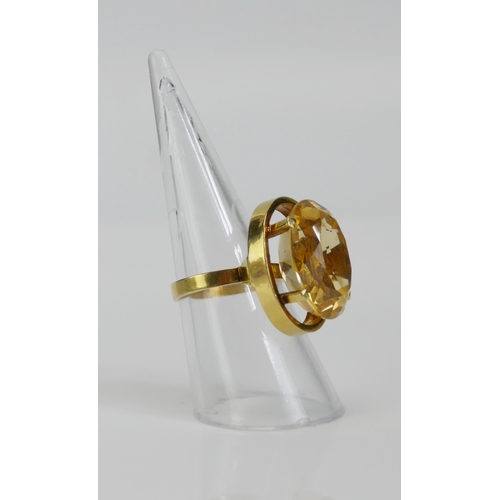 92 - A French 18ct Gold and Citrine Dress Ring, 20x14.9mm stone, size N.25, 9.23g