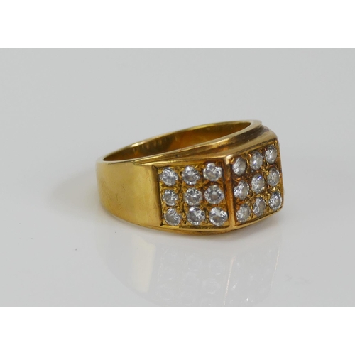 99 - An 18ct Gold and Diamond Ring, set with 2.3mm brilliant cuts arranged in three panels of nine, size ... 