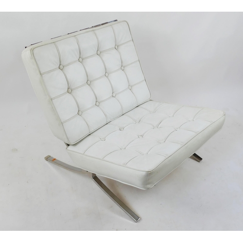 1457 - A Barcelona style easy chair with white faux leather button down cushions on a chrome frame.