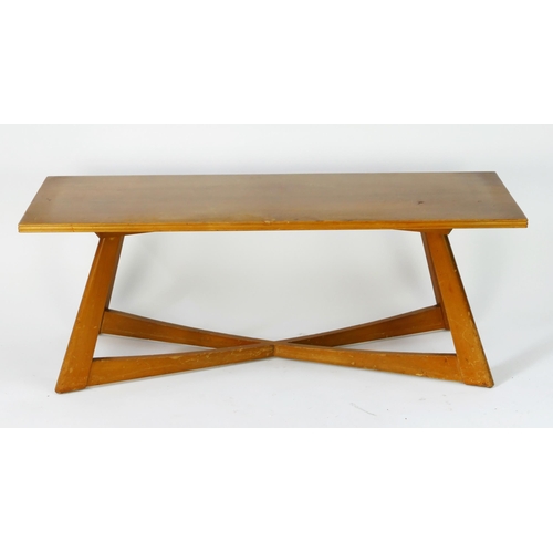 1466 - A 1960's/70's teak rectangular coffee table, raised on four swept legs linked by an X-frame stretche... 