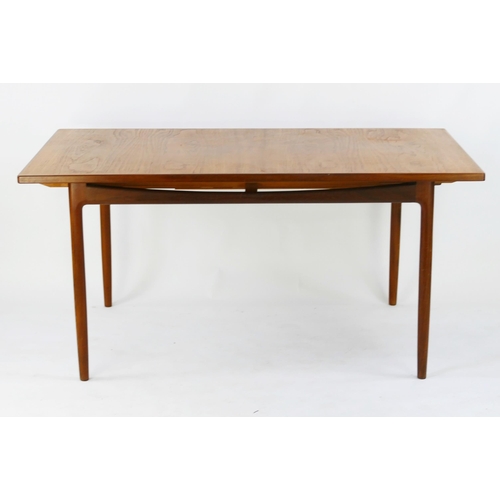 1469 - A G-Plan dining table to a Kofod Larsen design, extending dining table, the rectangular top raised o... 