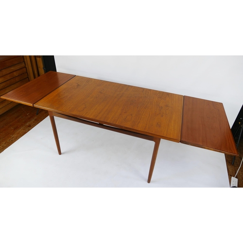 1469 - A G-Plan dining table to a Kofod Larsen design, extending dining table, the rectangular top raised o... 