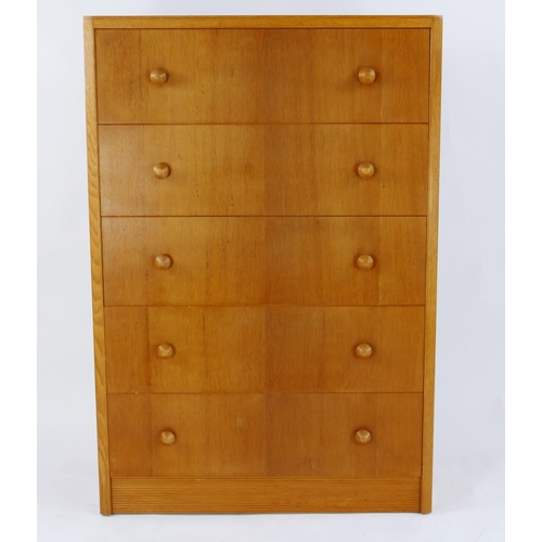 1471 - A Herbert E Gibbs, teak chest of drawers, of rectangular outline, containing four long drawers on a ... 