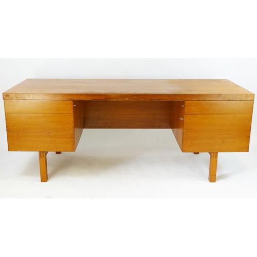 1476 - An 1960's Air Ministry teak twin pedestal desk, containing three short drawers and a cupboard door, ... 