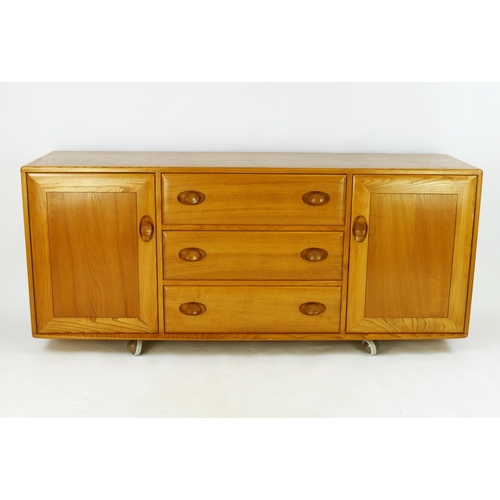 1478 - A teak Ercol sideboard, of rectangular outline, containing three central short drawers flanked by cu... 