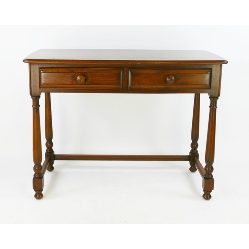 1479 - A teak Ercol side table with rectangular top, two frieze drawers. on ring turned legs linked by stre... 