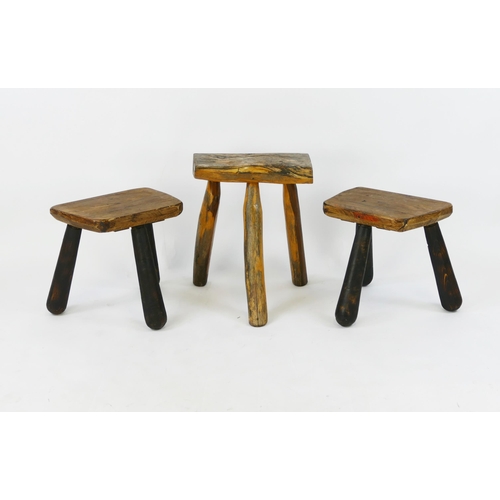 1480 - Three modern rustic foot stools on tripod supports. (3).