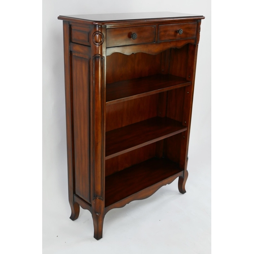 1486 - A Theodore Alexander mahogany open bookcase, with two short frieze drawers and three open shelves be... 