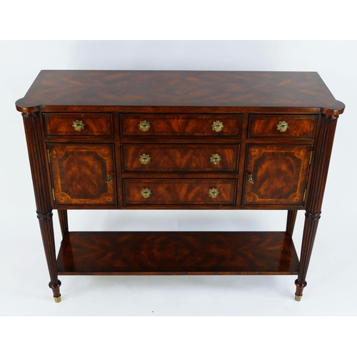 1487 - A Theodore Alexander mahogany and crossbanded sideboard, with rectangular top with three central sho... 