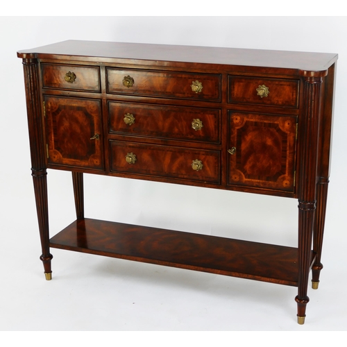 1487 - A Theodore Alexander mahogany and crossbanded sideboard, with rectangular top with three central sho... 