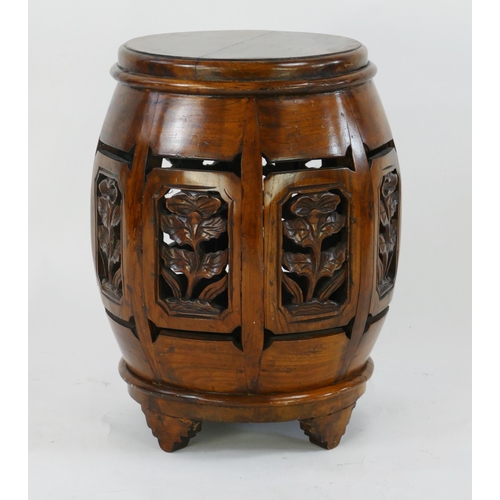 1490 - A modern Chinese hardwood jardiniere stand, of barrel-shaped outline, with pierced floral panels, 32... 