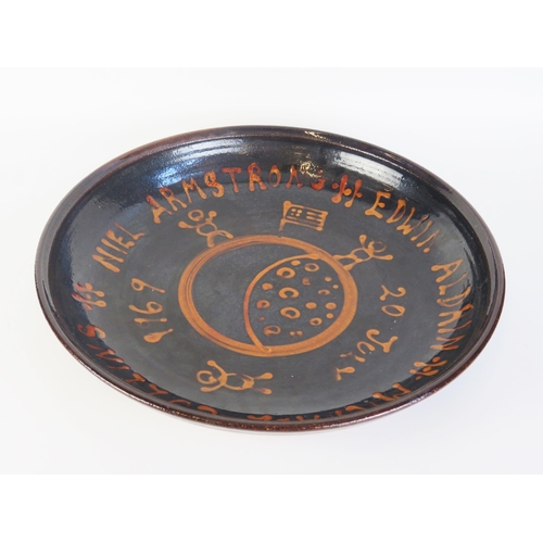 1504 - Peter Dick a studio pottery charger celebrating the moon landing 20th July 1969, impressed mark, 41c... 