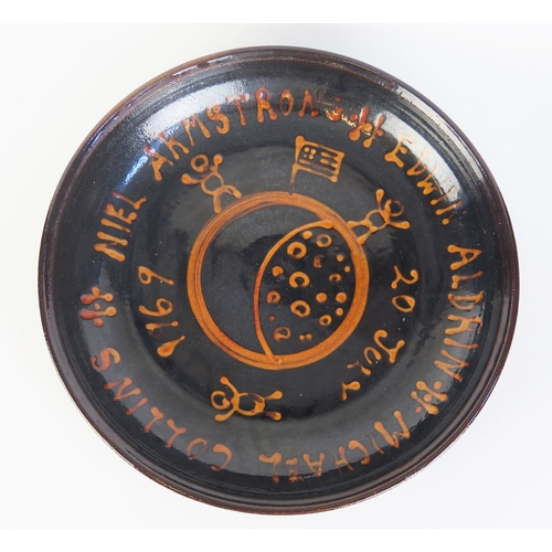 1504 - Peter Dick a studio pottery charger celebrating the moon landing 20th July 1969, impressed mark, 41c... 