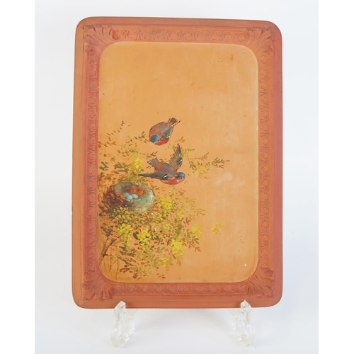 1508A - A Torquay pottery rectangular plaque, decorated with a birds nest and birds, 25 x 18cm