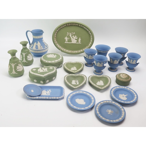 1525 - A collection of Wedgwood blue and green jasperwares including vases boxes, plate and jug.