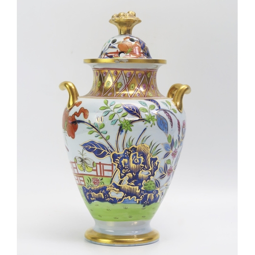 1529 - A 19th Century porcelain potpourri twin handled vase, of ovoid form with painted floral decoration h... 