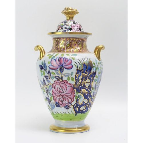 1529 - A 19th Century porcelain potpourri twin handled vase, of ovoid form with painted floral decoration h... 