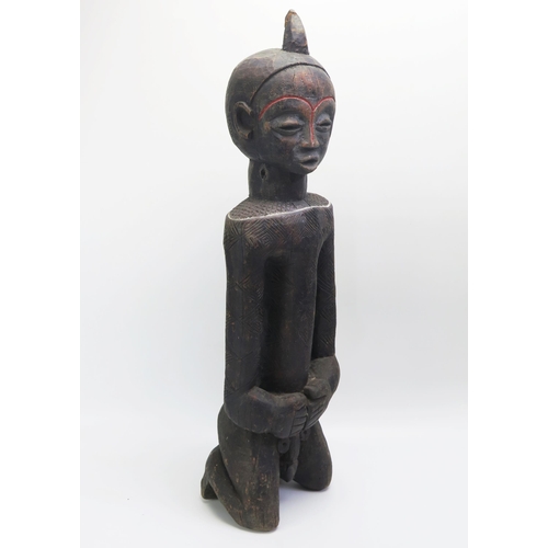 1534 - An African Luba Carved Wooden Figure of a Kneeling Male, 69cm