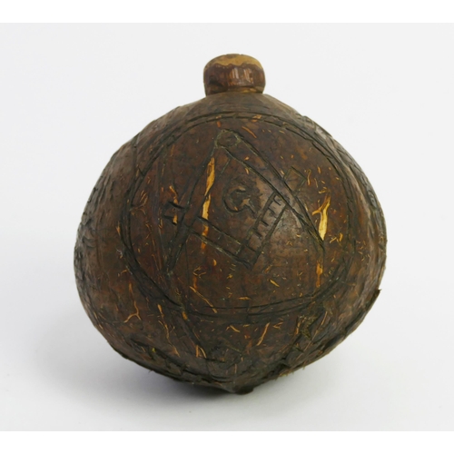 1534A - A late 18th/early 19th century carved gourd, with central cartouche bearing the Masonic badge of the... 