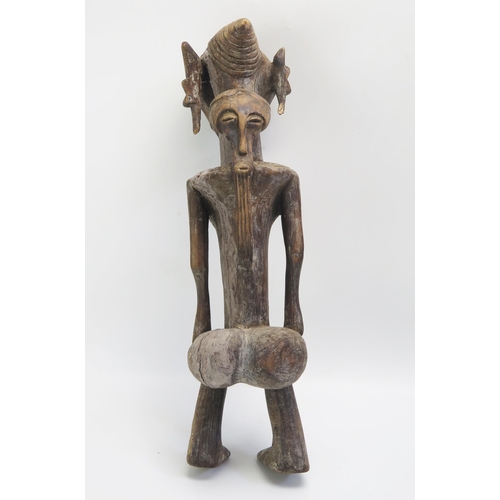 1535 - An African Luba Carved Wooden Figure of an Elderly Female with mask to the back, 48cm