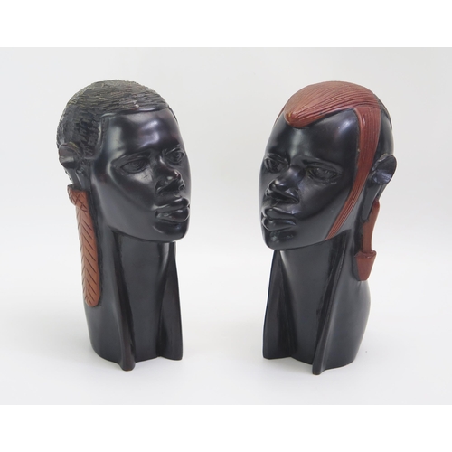 1536 - A pair of African carved hardwood female busts, 24cm and 23cm high