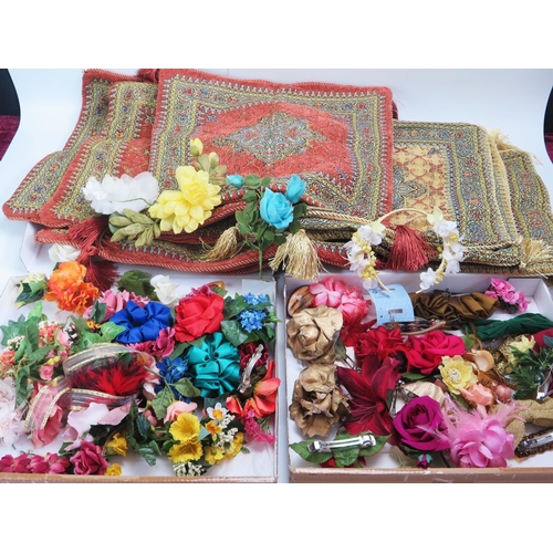 1539 - A collection of Persian design cushion covers, together with silk floral sprays and head bands etc.