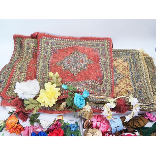 1539 - A collection of Persian design cushion covers, together with silk floral sprays and head bands etc.