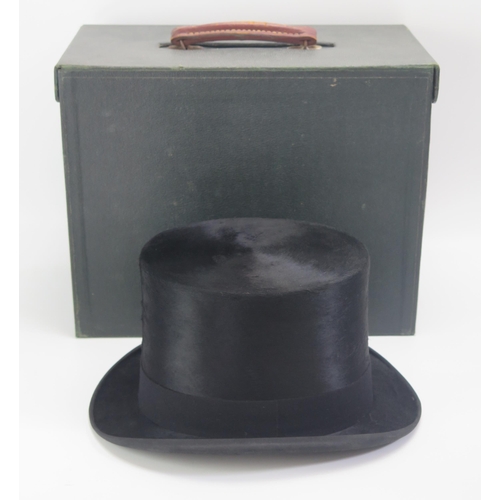 1541 - A Gents top hat by Austin Reed Ltd, contained in a fitted case, inner circumference of the hat 58cm.