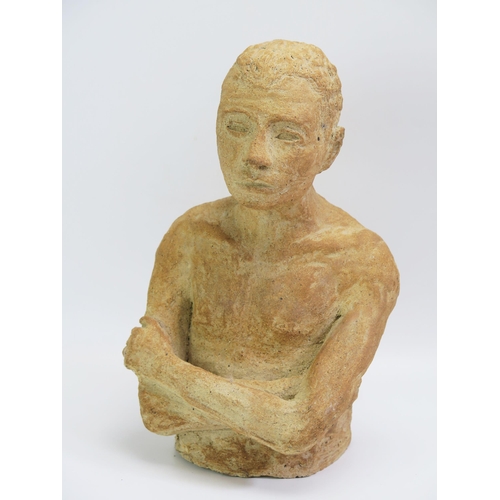 1566 - A stoneware half length bust of a man with crossed arms, unsigned, 34cm high.