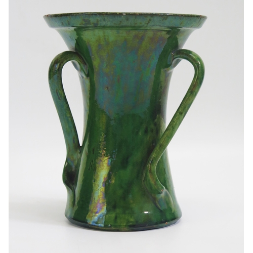 1575 - An Arts & Craft period pottery three handled vase, with variegated green glazes, possibly by the Dic... 