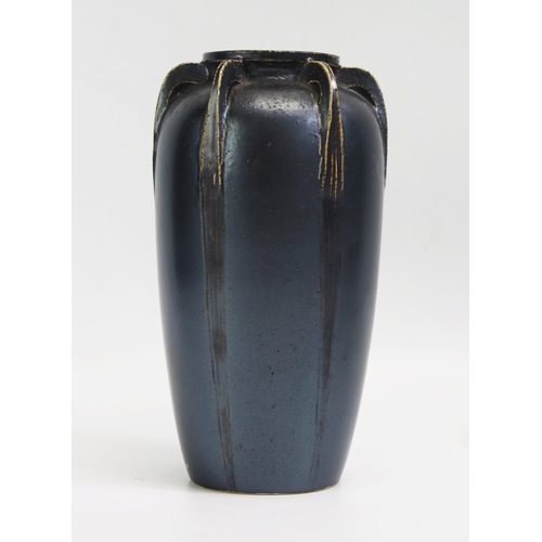 1576 - Martin Brothers Southall, an Art Nouveau period pottery vase of ovoid form, with six swept ribs to t... 