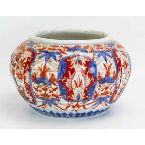 1591 - A Japanese Imari porcelain circular planter of lobed design with floral decoration, 24cm diameter.