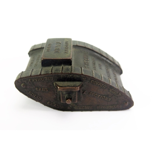 1606 - McKechnie Bros Ltd, Birmingham, and advertising model of a World War One tank, 8cm long.