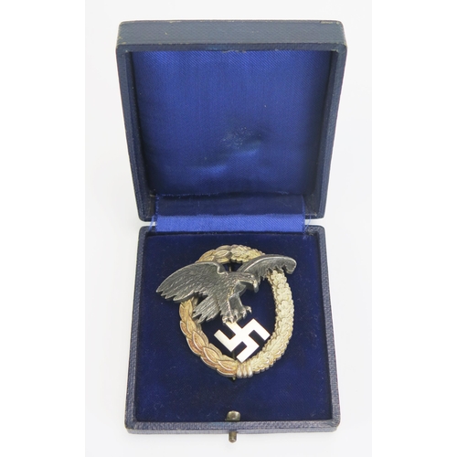 1609 - A Third Reich period Luftwaffe Observers Badge, by G Hosang, Dresden, the eagle holding a swastika w... 