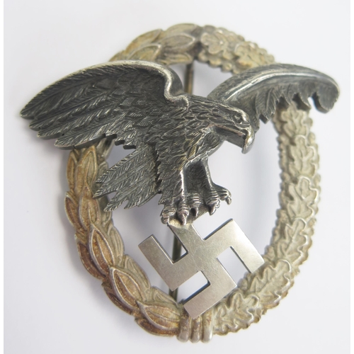 1609 - A Third Reich period Luftwaffe Observers Badge, by G Hosang, Dresden, the eagle holding a swastika w... 