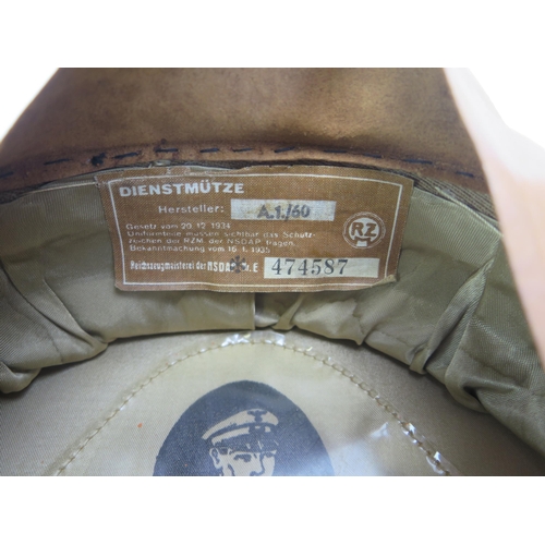 1616 - *WITHDRAWN* A Third Reich period Hitler Youth general's peak cap, bears makers label Holters Uniform... 