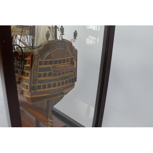 1638 - A hand built model of HMS Victory, with planked hull, simulated planked decking, cannons and life bo... 