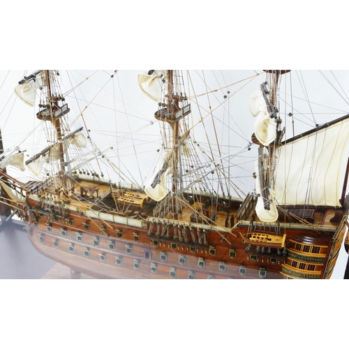 1638 - A hand built model of HMS Victory, with planked hull, simulated planked decking, cannons and life bo... 