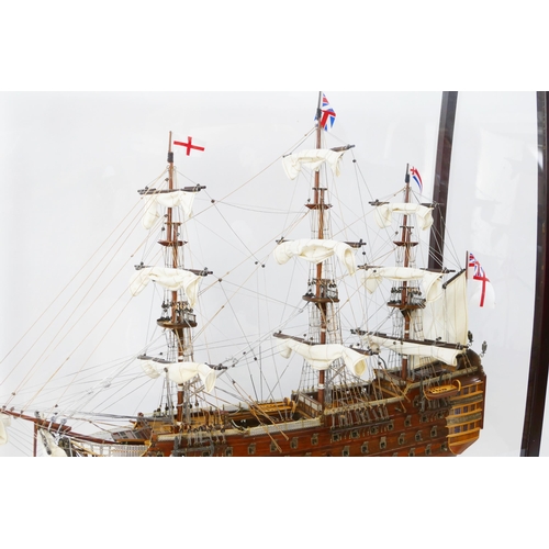 1638 - A hand built model of HMS Victory, with planked hull, simulated planked decking, cannons and life bo... 