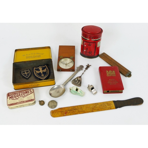 1639 - A collection of assorted advertising tins, Post Office Savings Bank tins, mahogany cased compass, le... 