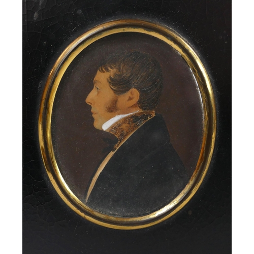 1640 - A 19th century miniature of a gentleman with white ruff and high collar, contained in an ebonised fr... 