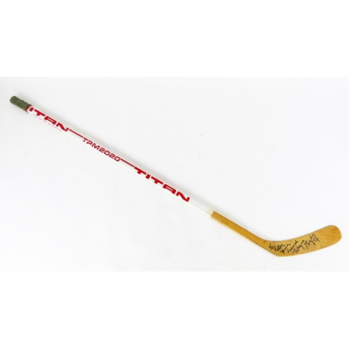 1641 - Wayne Gretzky, A Titan TPM2020 ice hockey stick, stencil W. GRETZKY, No 1-002 dated 25th February 19... 