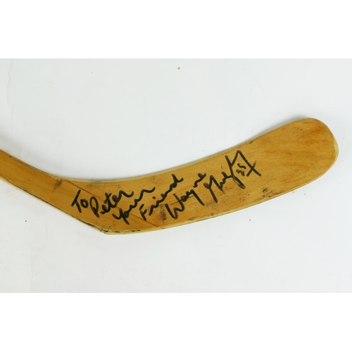 1641 - Wayne Gretzky, A Titan TPM2020 ice hockey stick, stencil W. GRETZKY, No 1-002 dated 25th February 19... 