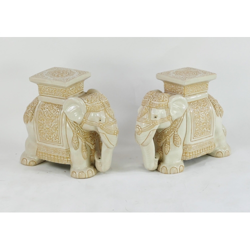 1651 - Two near matching modern Chinese jardinière stands in the form of elephants dressed in robes, 50cm l... 