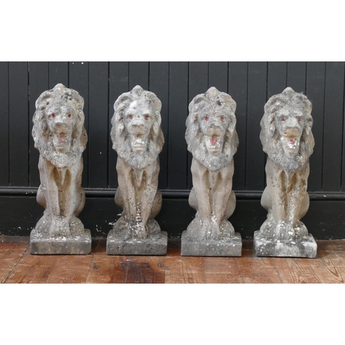 1660 - A set of four reconstituted stone lions sejant, mounted on rectangular base, 57cm high. (4).