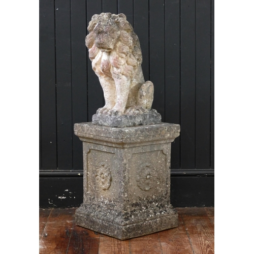 1662 - A reconstituted stone lion sejant, on rectangular base, mounted on a reconstituted plinth 57cm high.... 