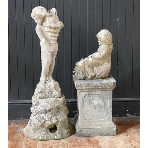 1665 - A reconstituted stone fountain modelled as a putti holding a cornucopia, mounted on a rocky naturali... 