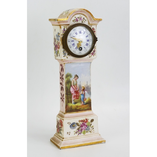 1677 - A continental porcelain model of a long case clock, with 6cm dial , the case with floral decoration,... 