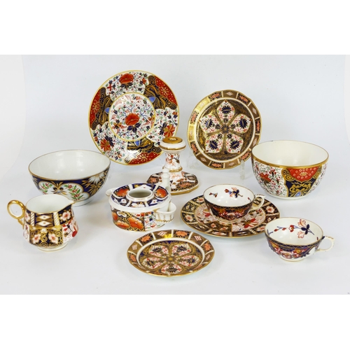 1706 - A collection of Royal Crown Derby porcelain and other wares, including cups saucers, candlestick, bo... 