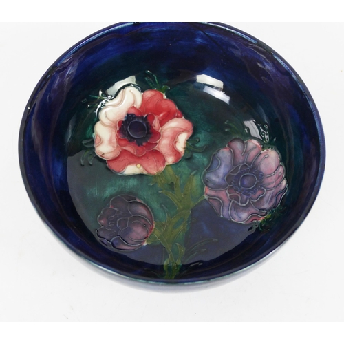 1710 - A Moorcroft pottery bowl with anemone pattern decoration, 13.5cm diameter.